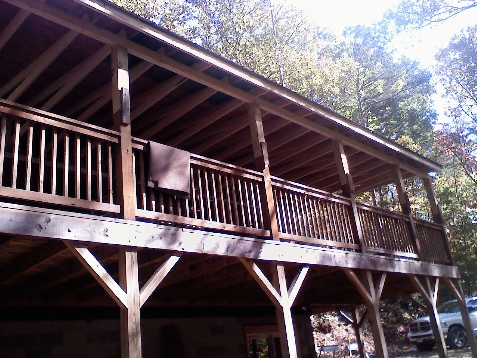 Timber framing under a new elevated porch and deck in New Castle